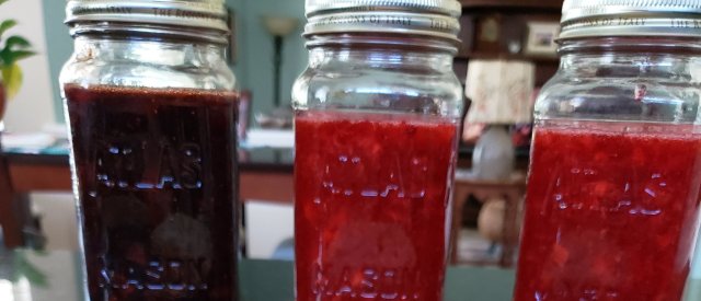 jars of jams - dark balsamic on the left, 2 strawberry on the right